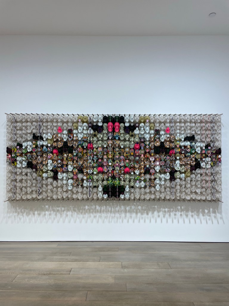 Design and Style Report image< The Disappointment Engine large scale multi-colored circles and patterns arranged on a canvas