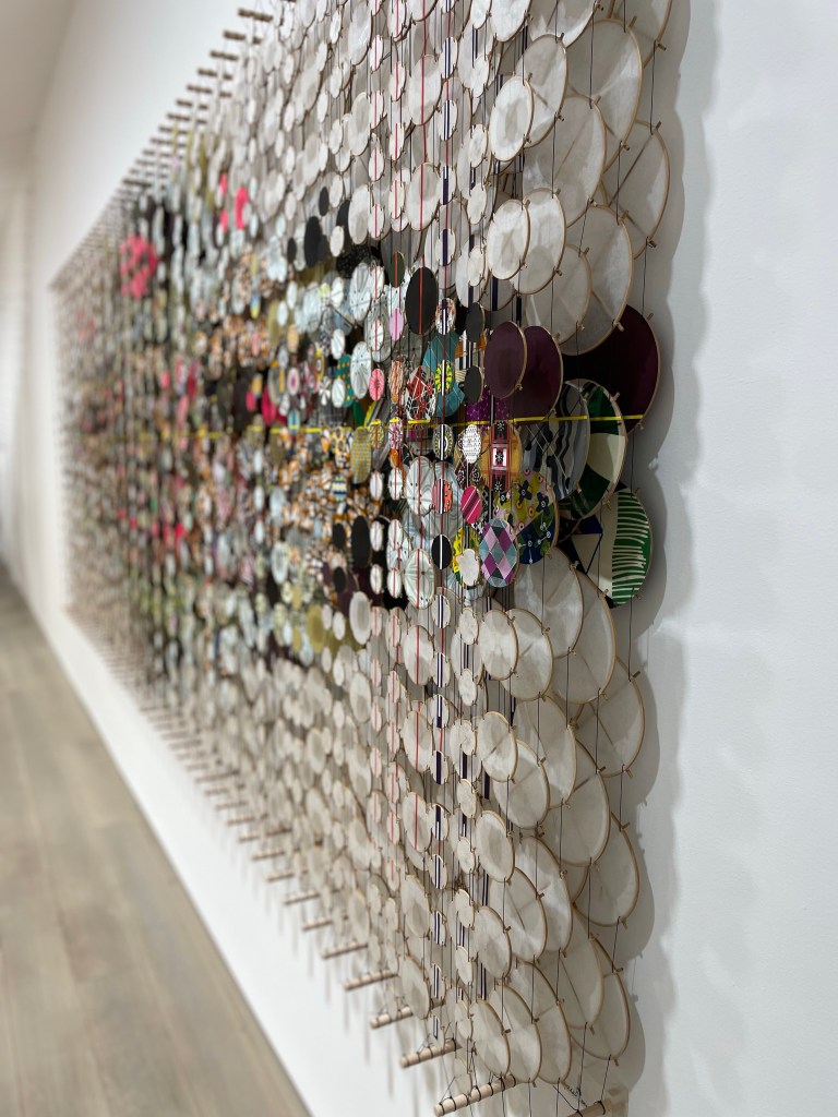 Design and Style Report image< The Disappointment Engine multi-patterned circles arranged on a canvas side view